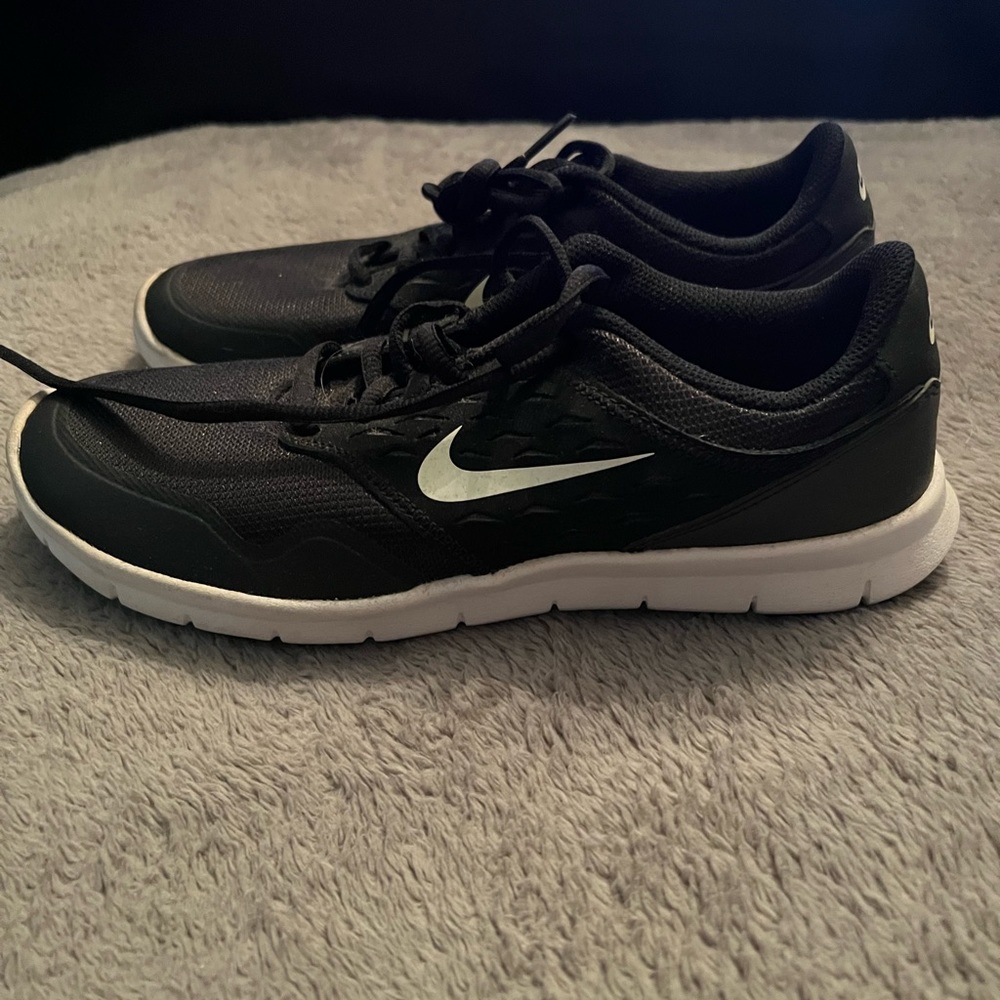 Black and white Nike shoes